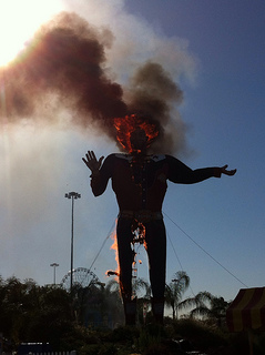 statue of Tex burning