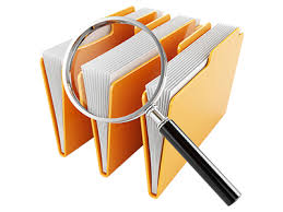graphic of magnifying glass in front of 3 filled and expanded file folders