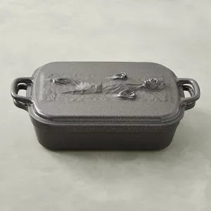 casserole dish from Williams Sonoma featuring a relief replication of Han Solo in Carbonite on the lid