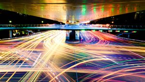 slow exposure of busy traffic intersection at night