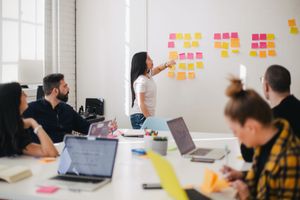 People being trained in a conference room