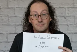 Adam holding a reddit AMA sign