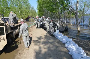 Soldiers building an emergency levee