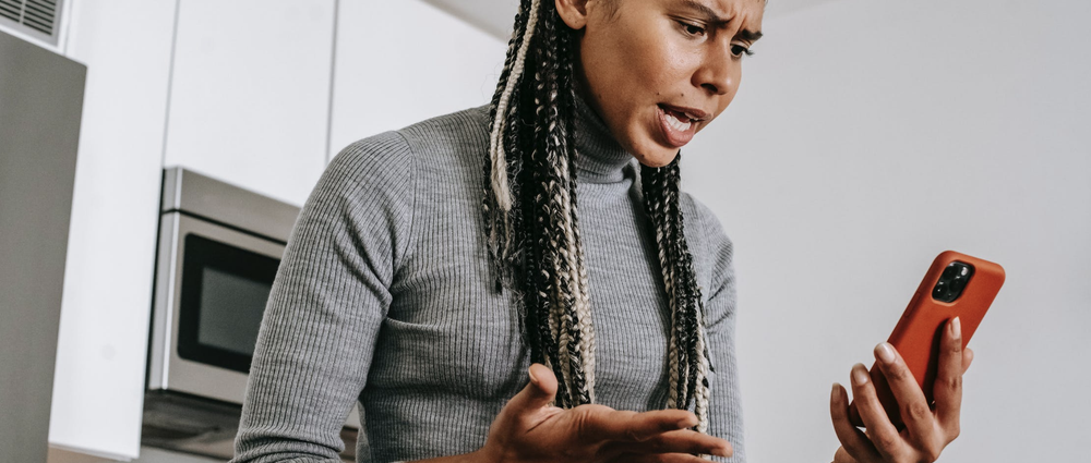 A person screaming into a phone