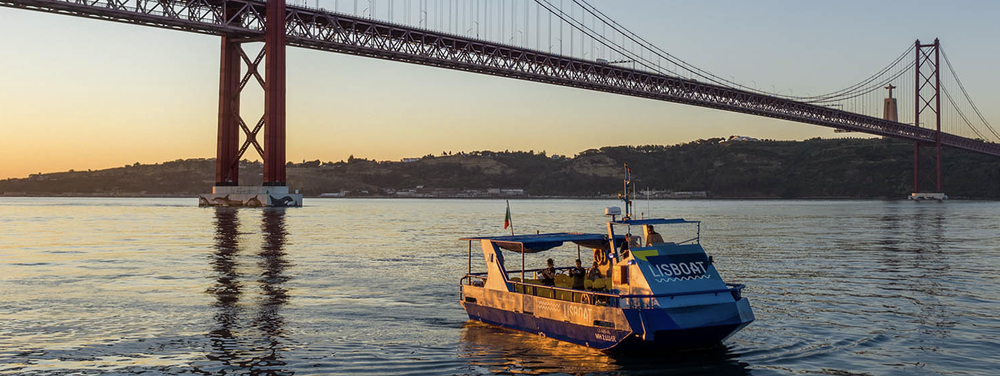 A Lisbon Ferry in front of their Golden-gate clone