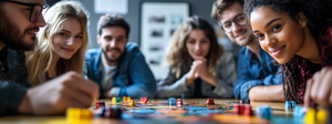 A group of people happily playing a strategic game