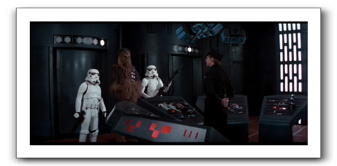 Luke, Han, and Chewie in front of the cell block commandant